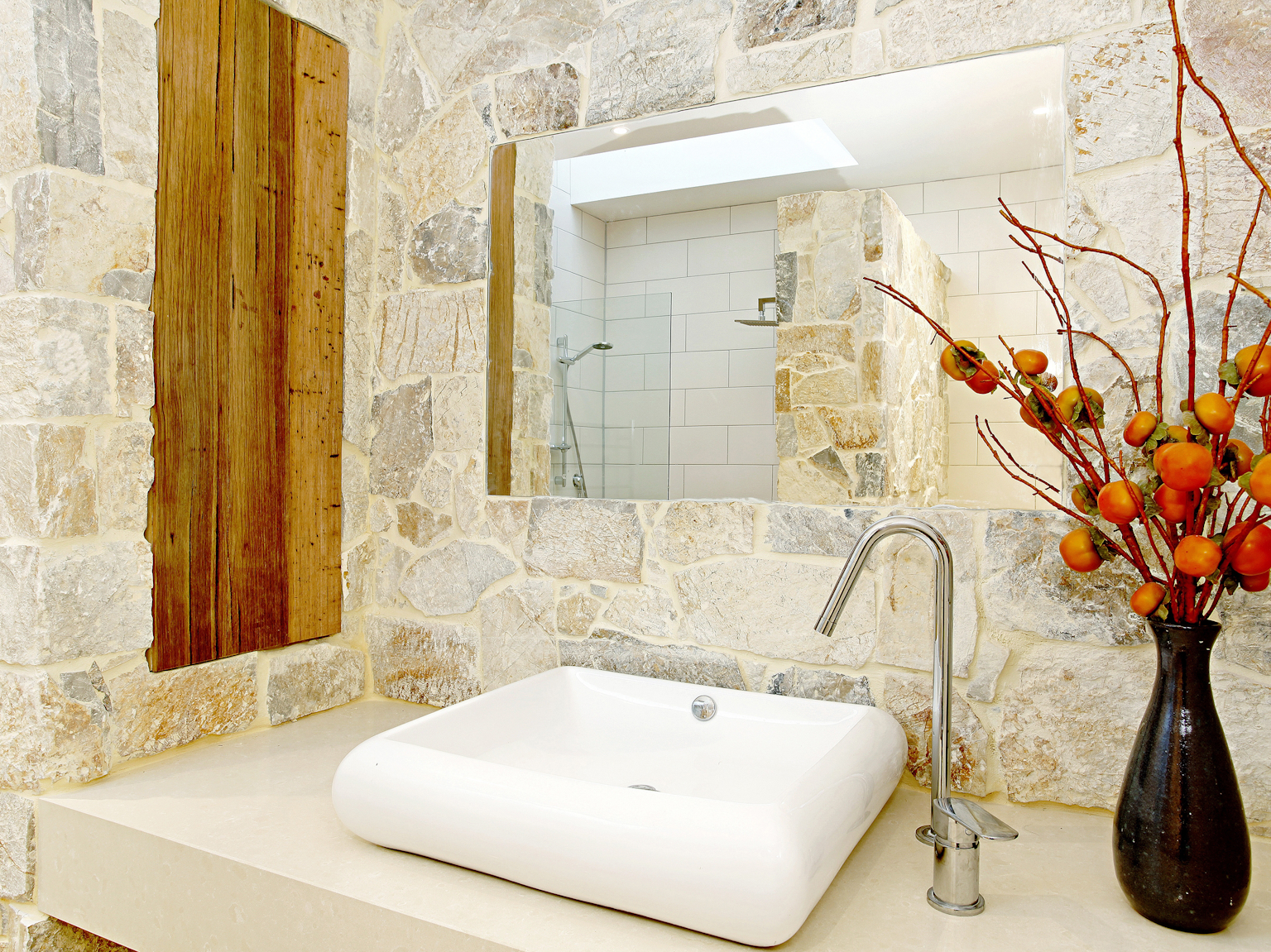 Coolum limestone random ashlar walling used as feature wall in bathroom design