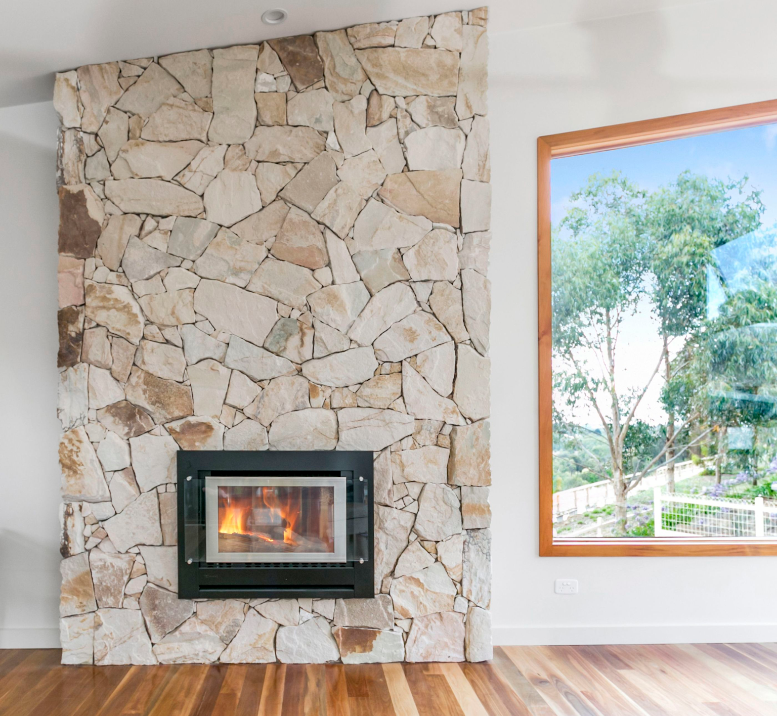 Crackenback free form sandstone fireplace 