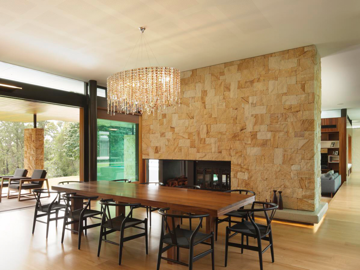 Internal living area with Killcare random ashlar sandstone walling on fireplace