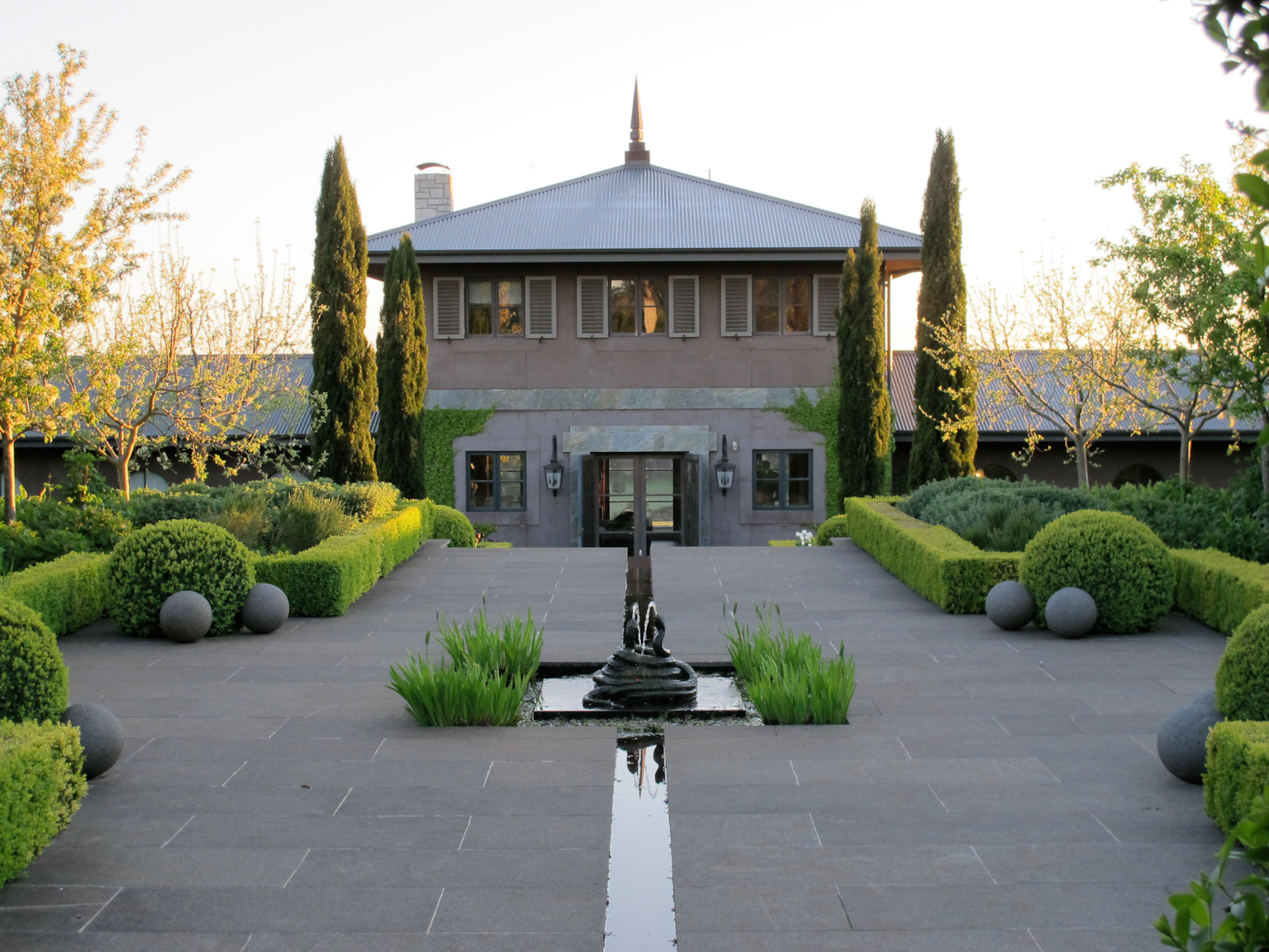 Paul Bangay's residence and manicured gardens at Stonefields using Raven granite paving