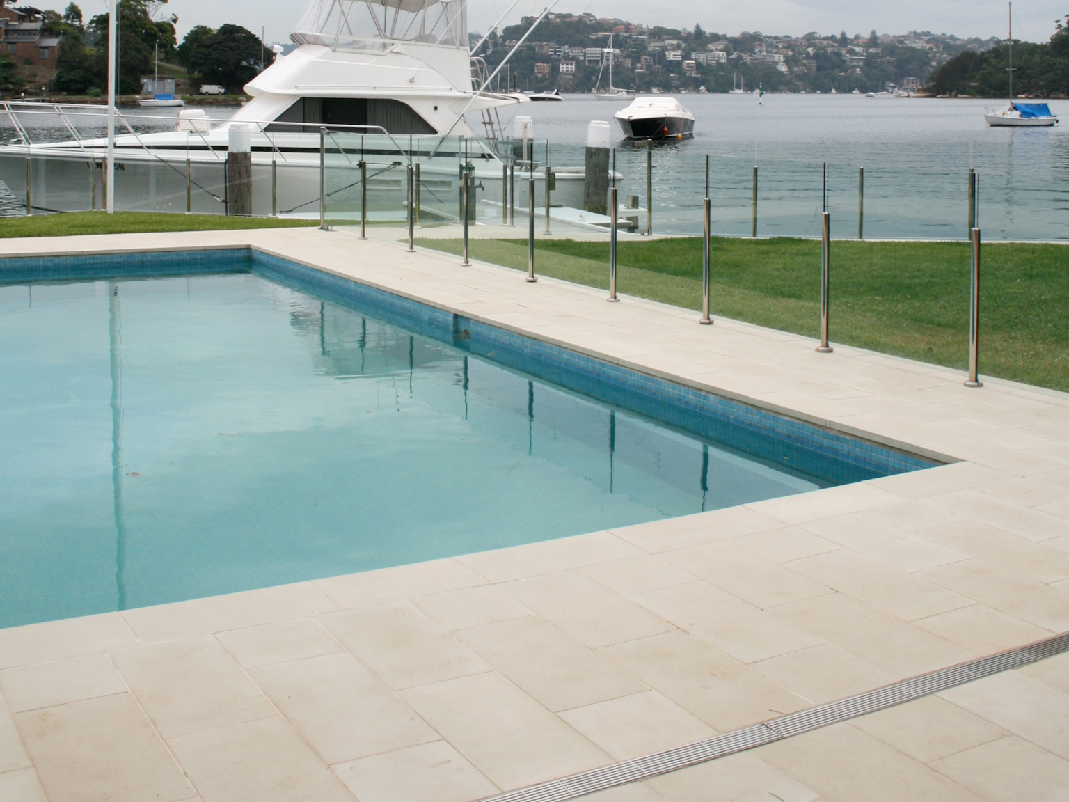 Cashmere concrete pavers and coping units used around square pool