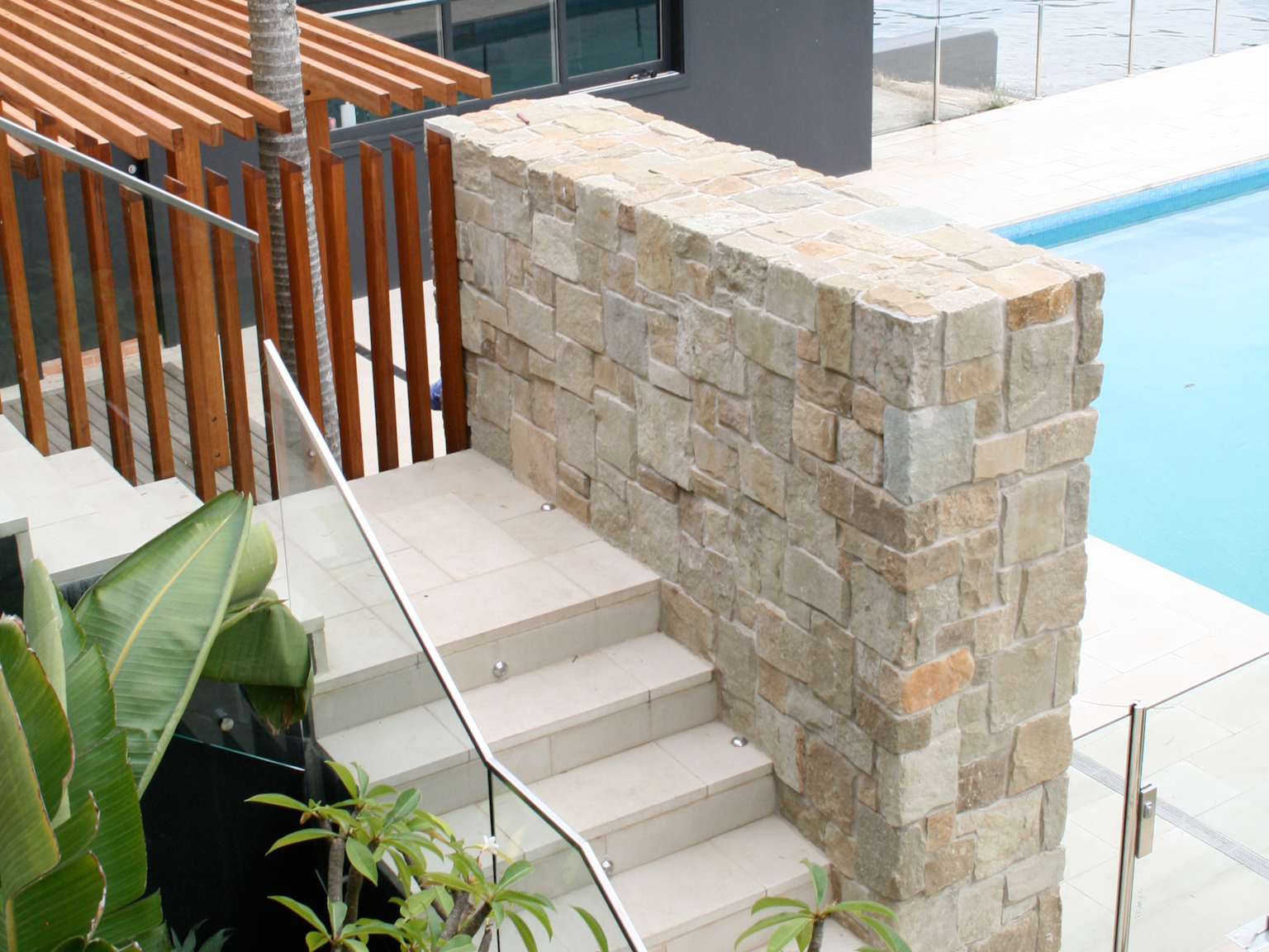 Clancy sandstone random ashlar feature wall with Cashmere concrete stairs 