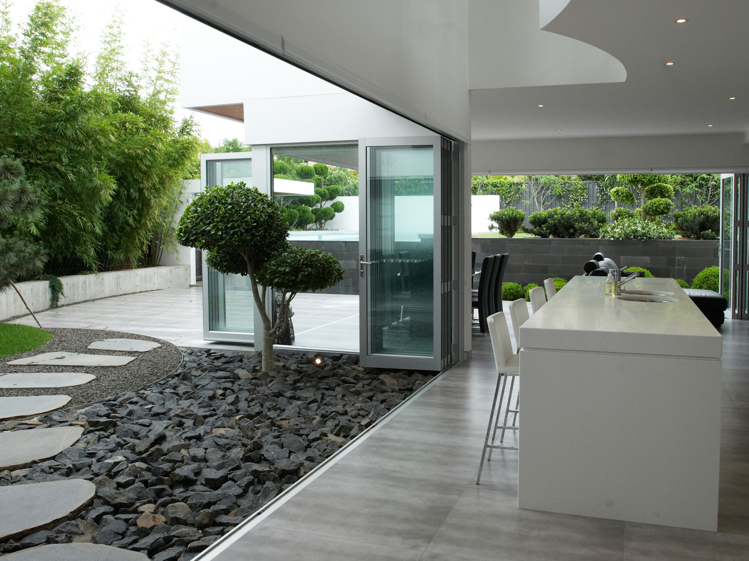 Bluestone organic steppers used a pathway through contemporary garden