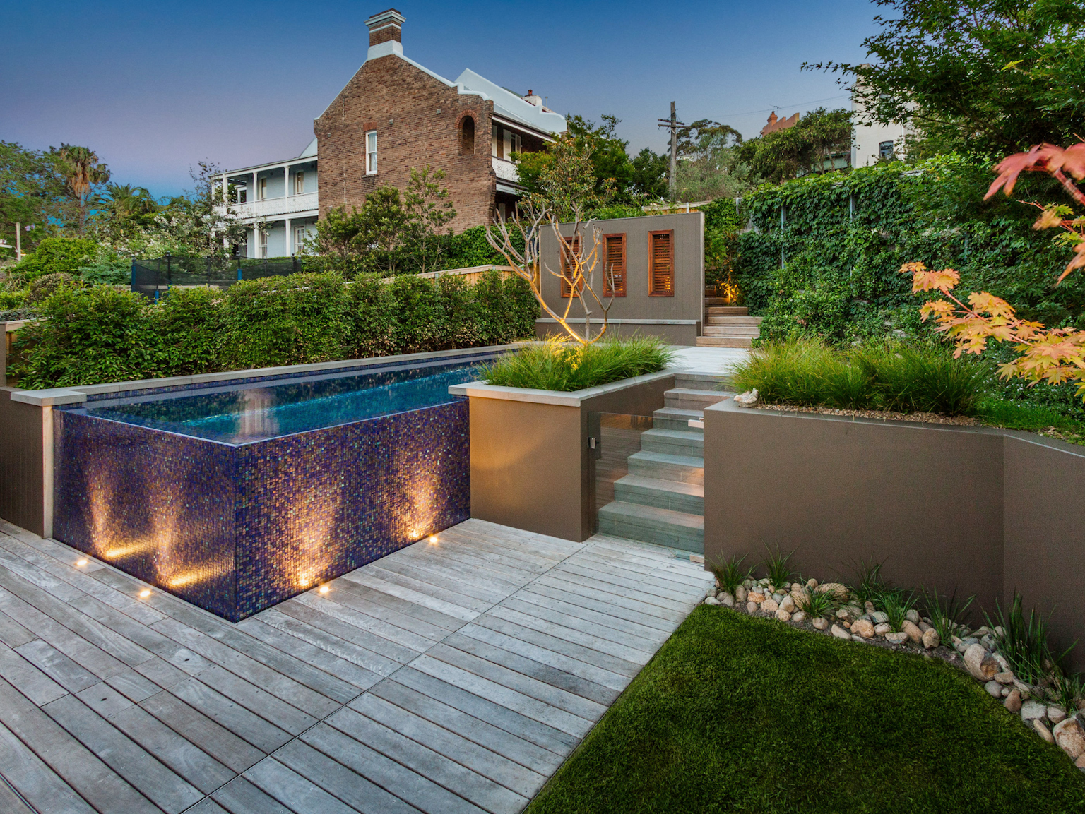 Terraced garden with bluestone pool coping and steps