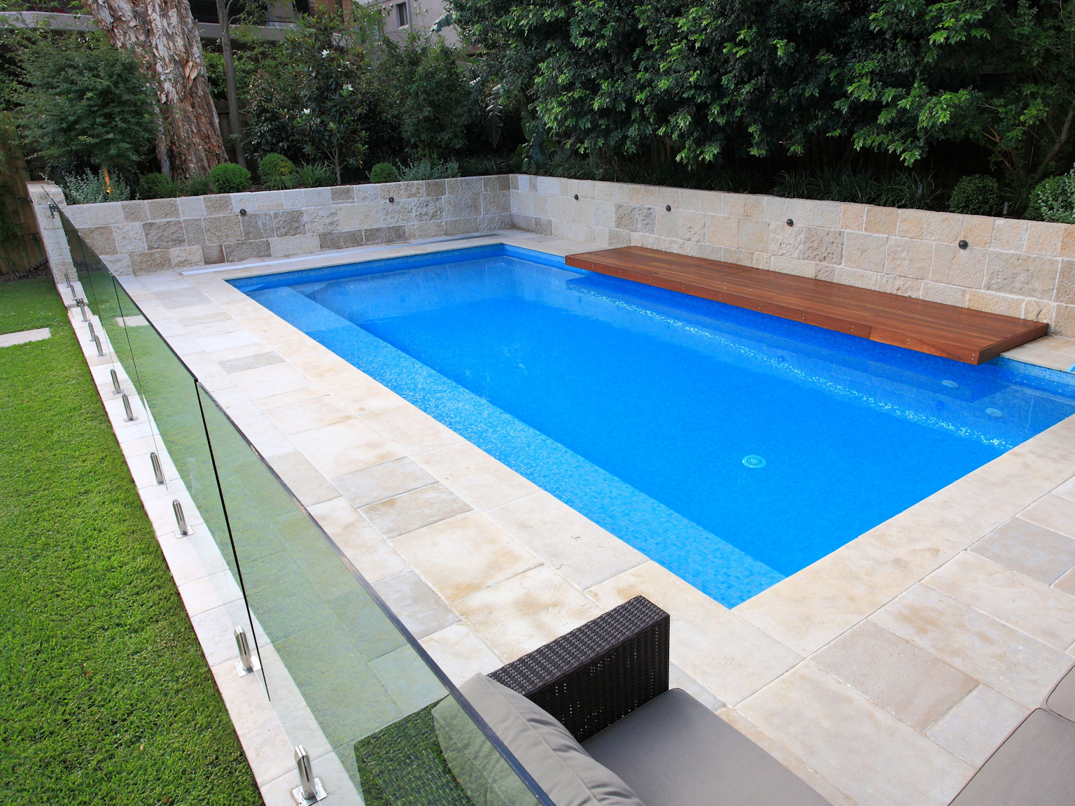 Beauford sandstone paving used as pool surround with Barrimah sandstone walling 