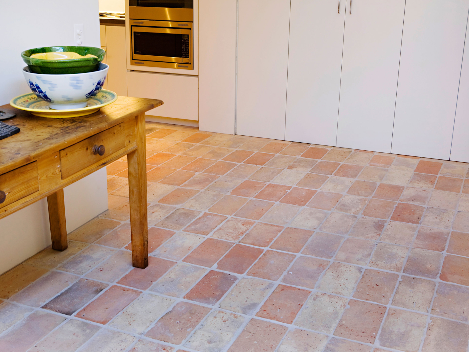 Antico Luce terracotta tiles used internally through kitchen area