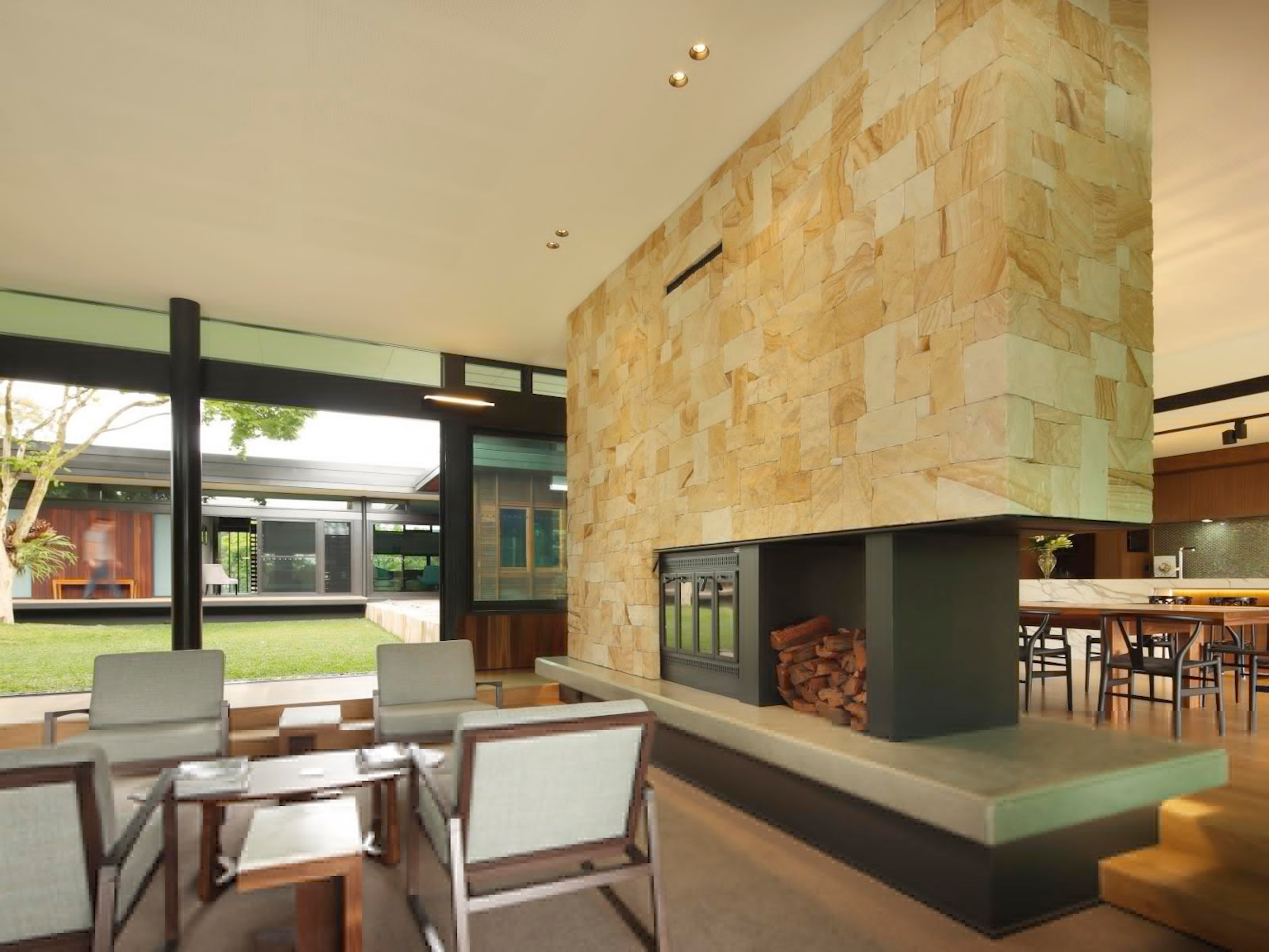 Modern home with Killcare sandstone random ashlar fireplace 