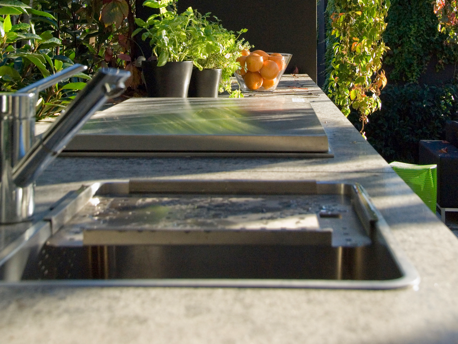 Outdoor kitchen with Torino bluestone bench top