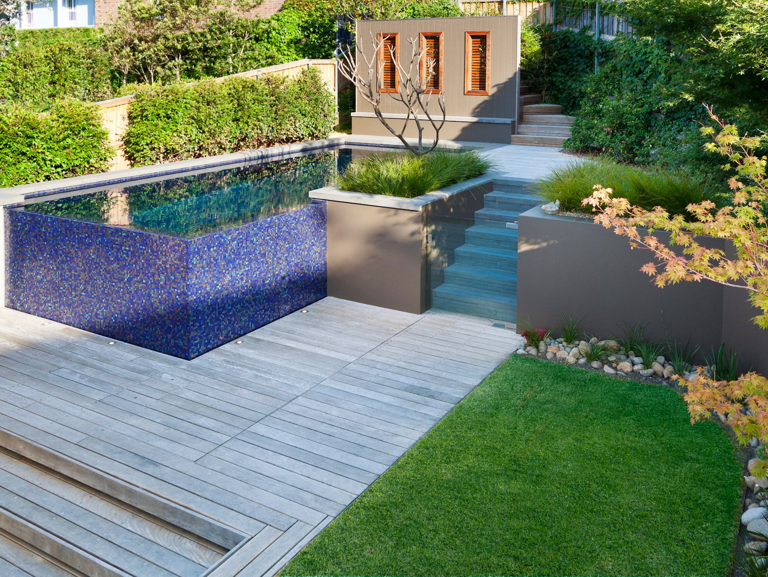 Terraced garden with rebated bluestone pool coping