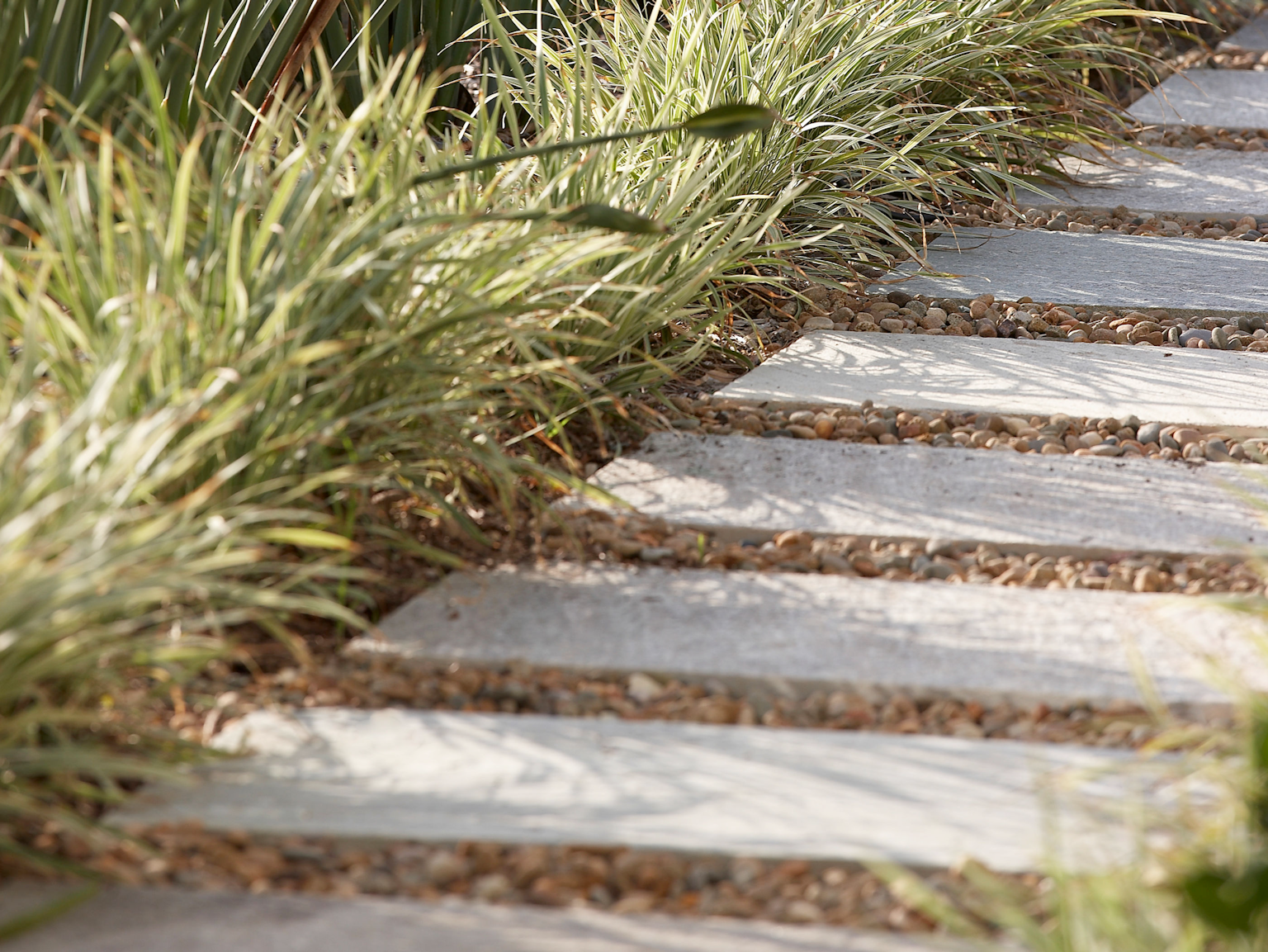 Cobb & Co split stone pavers used as stepping stone garden path 