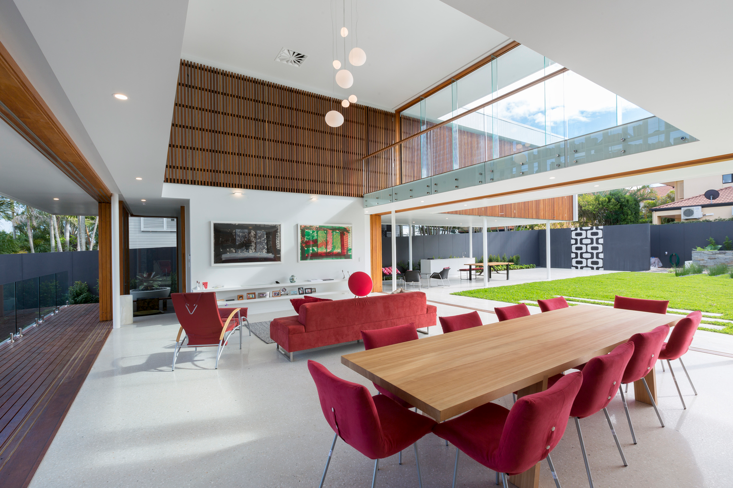 The open living, dining, kitchen of Clayfield House